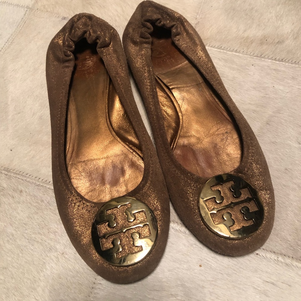 Tory Burch brushed gold flats.